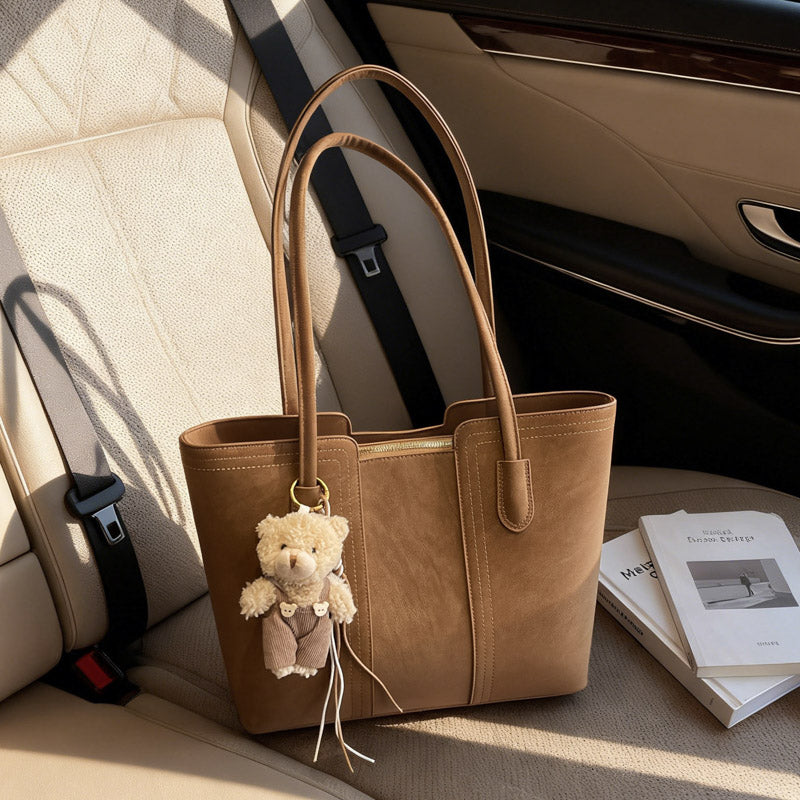 A shoulder bag exudes elegance.