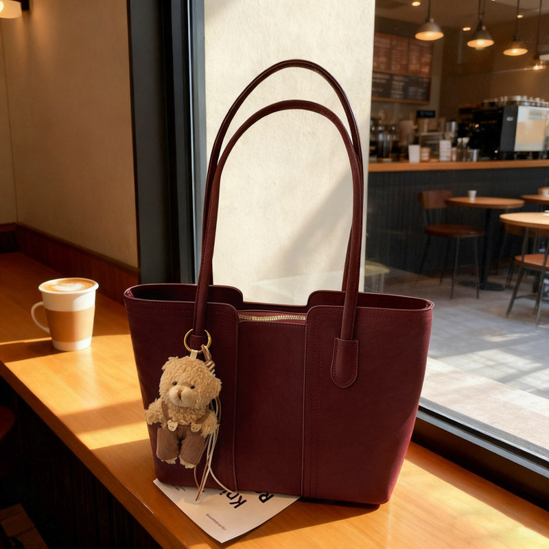 A shoulder bag exudes elegance.