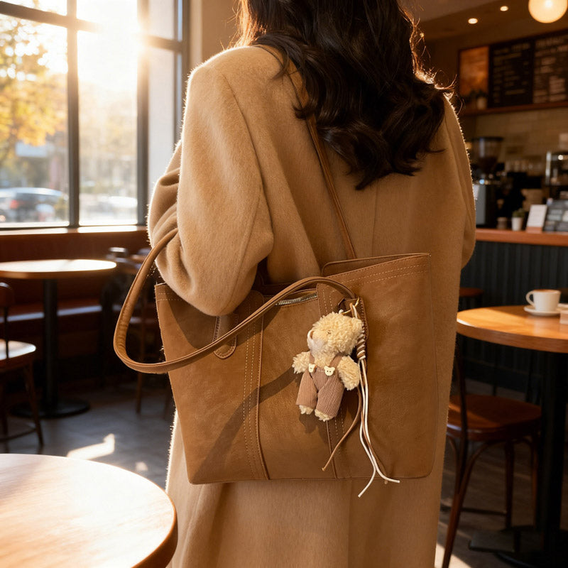 A shoulder bag exudes elegance.
