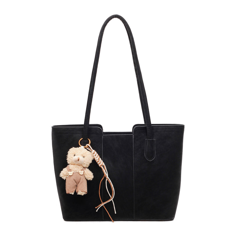 A shoulder bag exudes elegance.